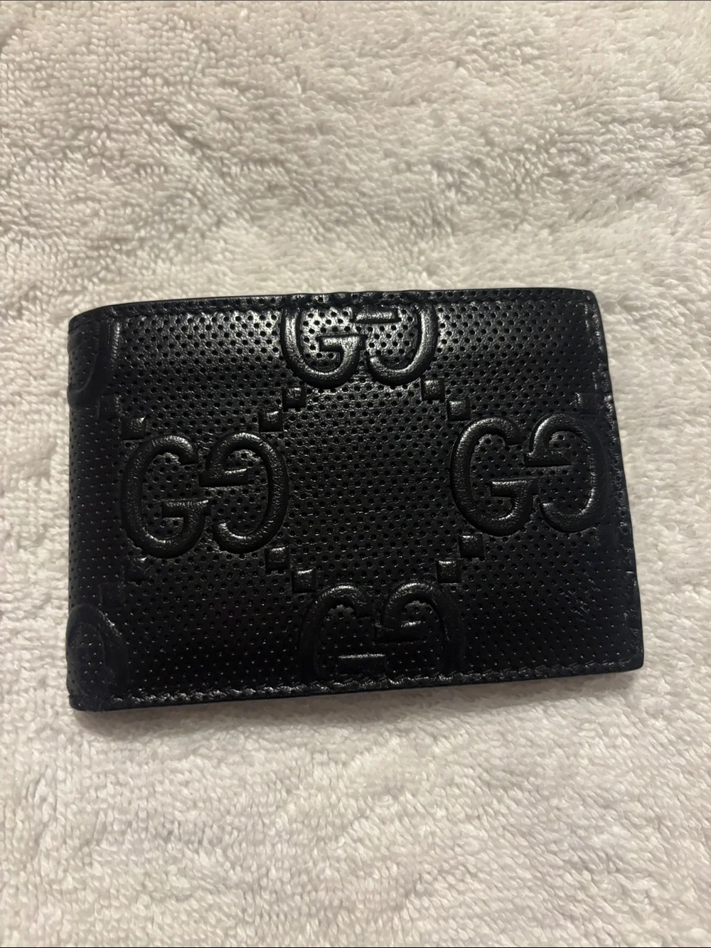 Gucci Black Perforated GG Embossed Leather Wallet